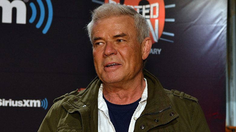 Eric Bischoff looks to his right