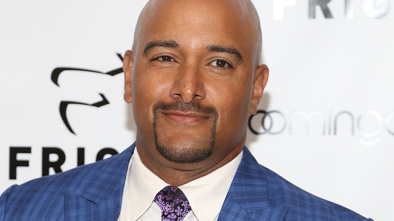 Jonathan Coachman wearing a blue suit