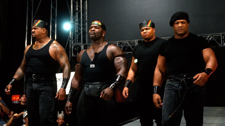 Kama Mustafa (The Godfather), Ahmed Johnson, D'Lo Brown, and Faarooq