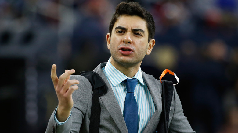 Tony Khan waiting on the field before a Jacksonville Jaguars game against the Houstan Texans. December, 2014