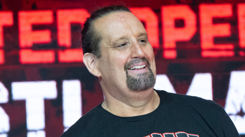 Tommy Dreamer showing off his forehead scars