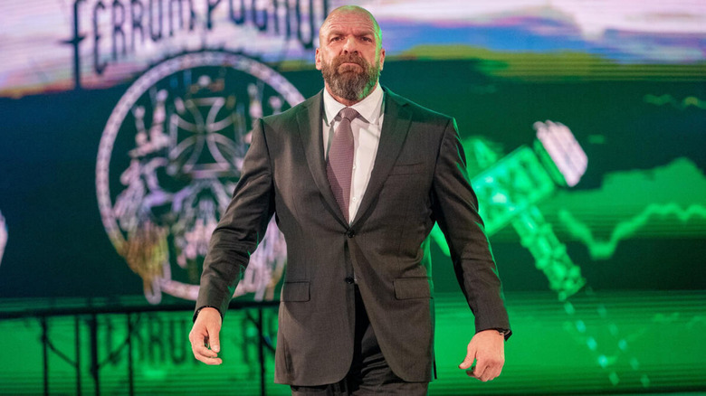 Triple H walking to the ring