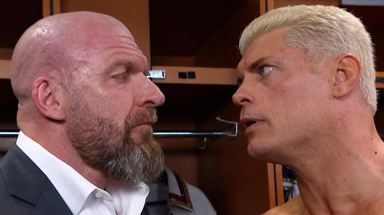 Triple H and Cody Rhodes in a staredown.