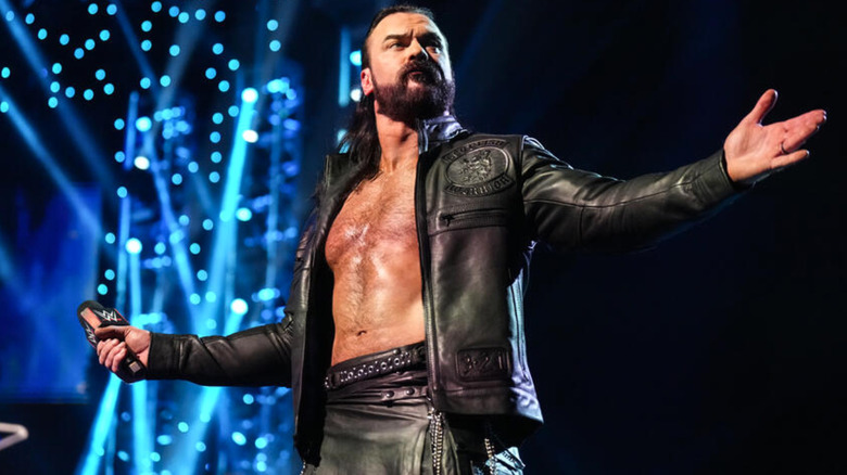 Drew McIntyre wearing a black leather jacket