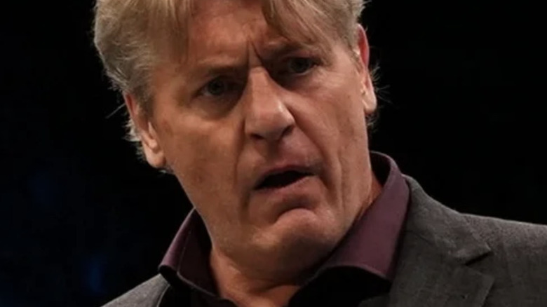 William Regal standing in the ring