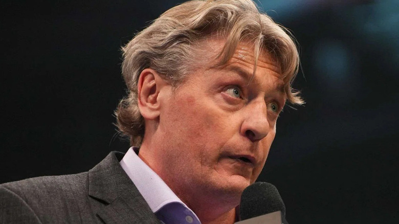 William Regal Holding An AEW Mic