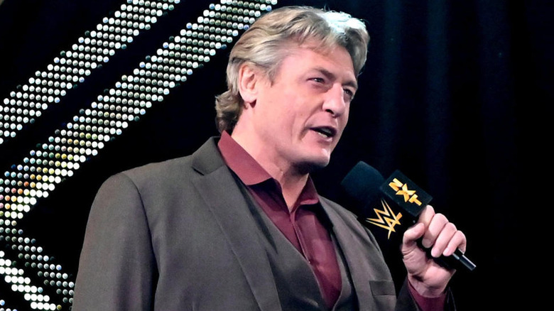 William Regal Holding An AEW Mic