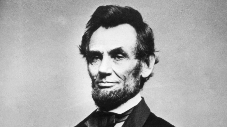 Abraham Lincoln posing