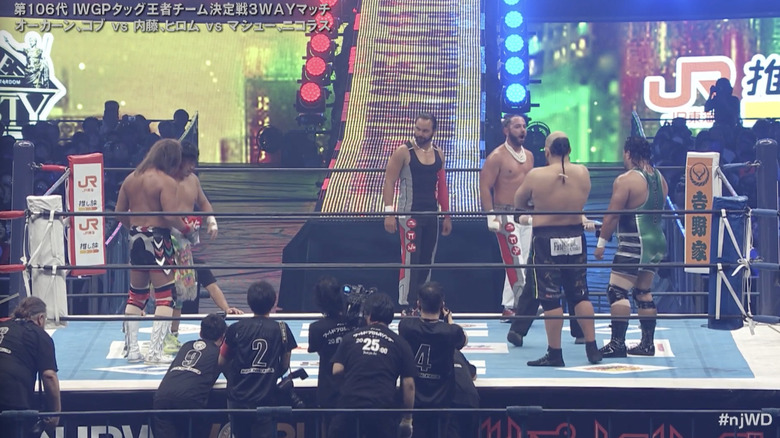 The three teams inside the ring