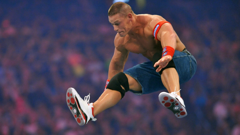 John Cena dropping leg at Mania