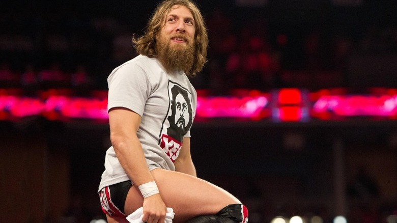 Bryan Danielson standing on turnbuckle