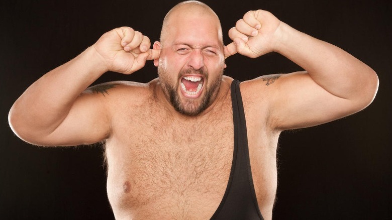 Big Show plugging his ears