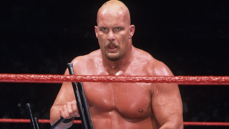 Steve Austin holding a chair