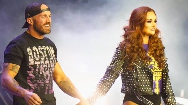 Maria Kanellis and Mike Bennett in smoke