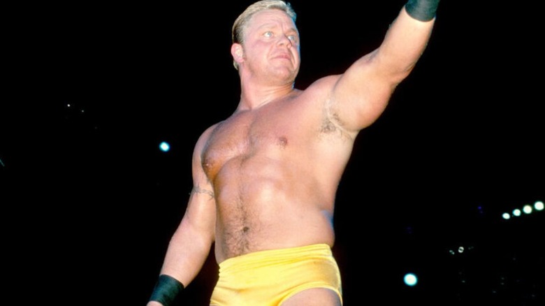 Shane Douglas poses in the ring before a wrestling match.