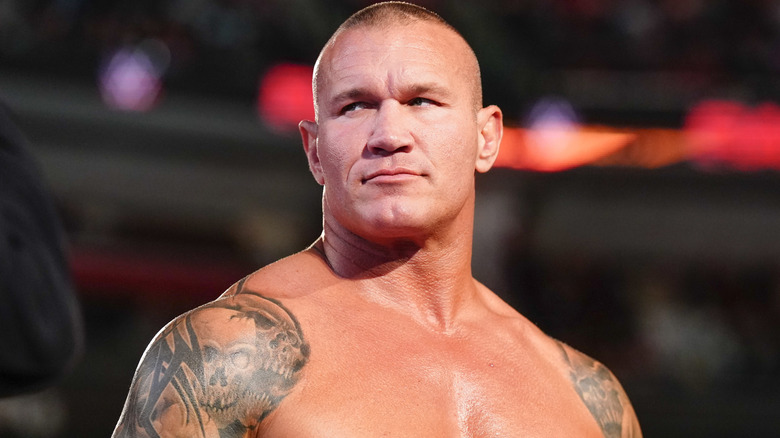 A closeup of Randy Orton looking over his right shoulder