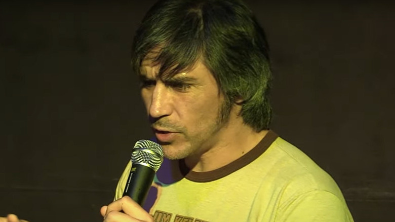 Paul London with a mic