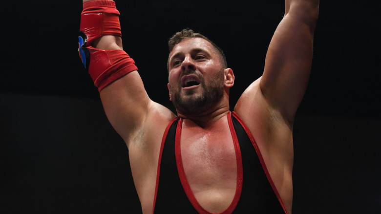 Colt Cabana lifting his arms