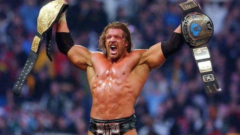 Triple H raises world titles