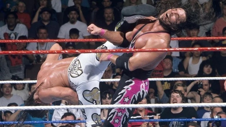 Shawn Michaels superkicking Bret Hart