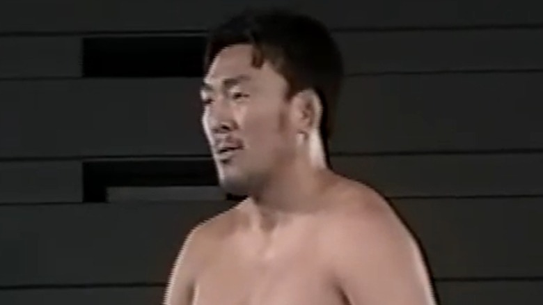 Masakazu Fukuda looks at opponent