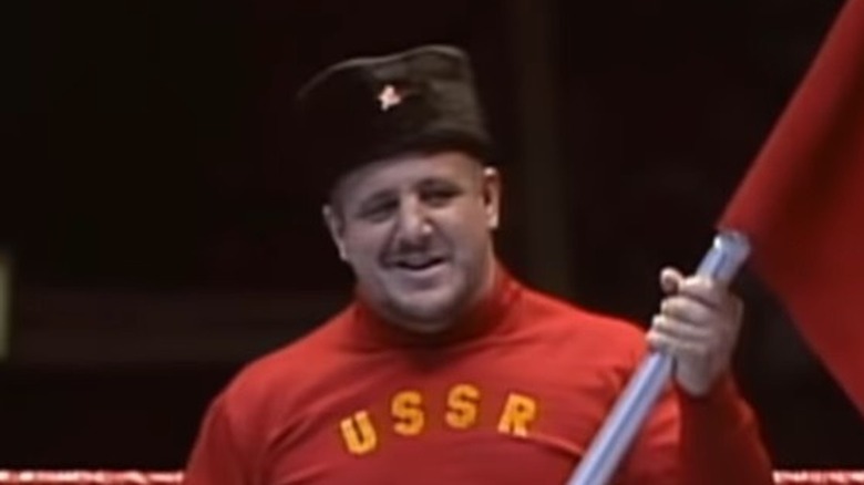 Nikolai Volkoff holding a USSR flag