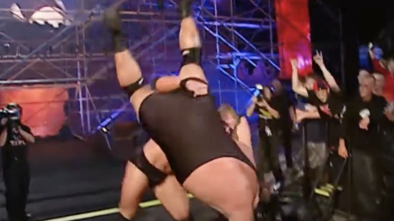 Brock Lesnar body slams The Big Show