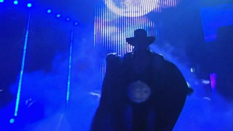 Undertaker removing his jacket at Elimination Chamber 2010