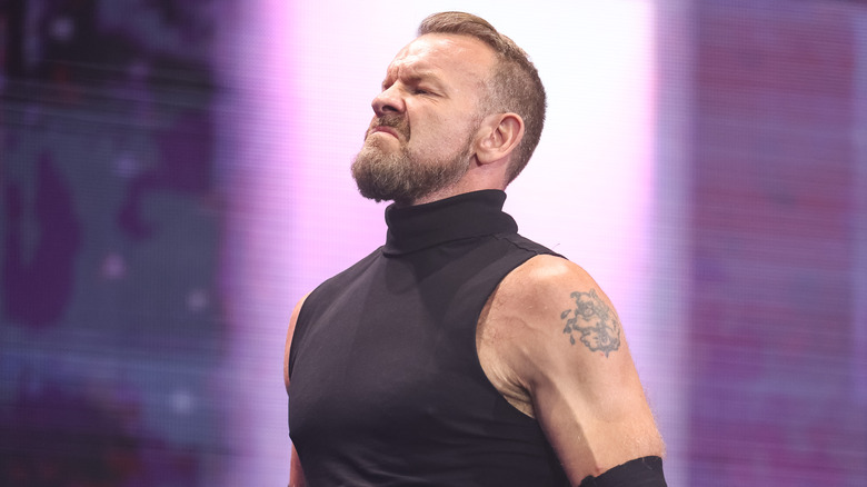 Christian Cage sneering turtleneck