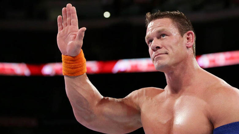 John Cena raising his arms