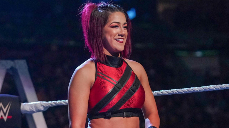 Bayley smiling in WWE ring