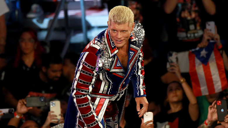 Cody Rhodes standing on the ring post