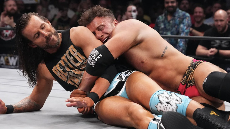 MJF hugging Adam Cole in the ring