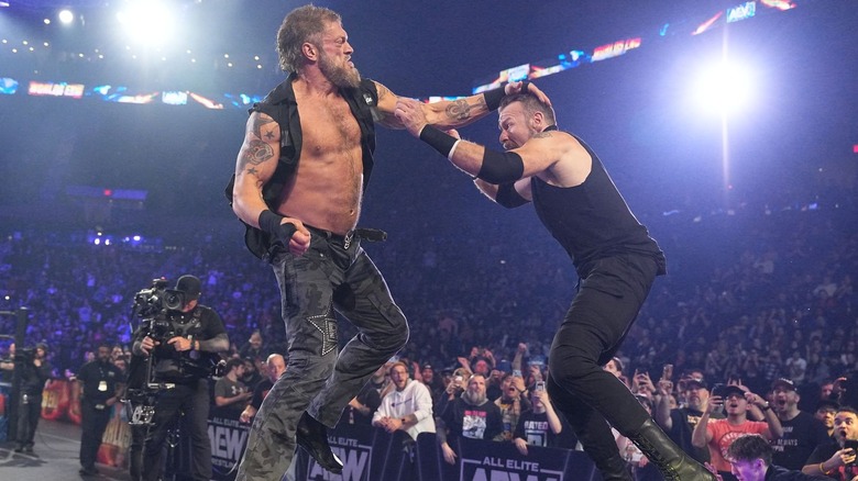 Adam Copeland and Christian Cage brawl