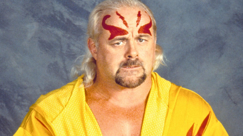 Kevin Sullivan wearing a yellow robe