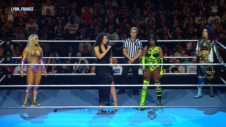 Bayley, Naomi, and Stratton in the ring
