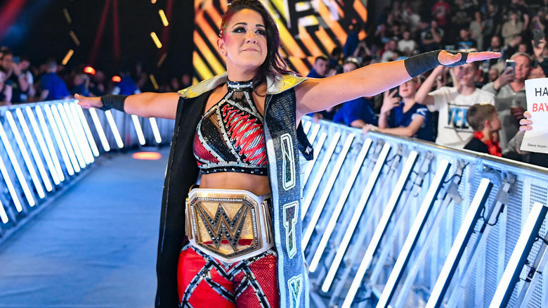 Bayley poses with title