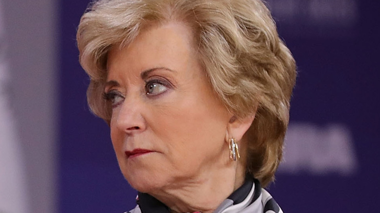 Linda McMahon looking left