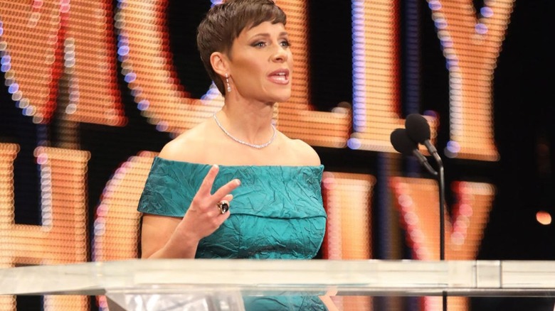 Molly Holly speaks on stage during her WWE Hall of Fame Induction.