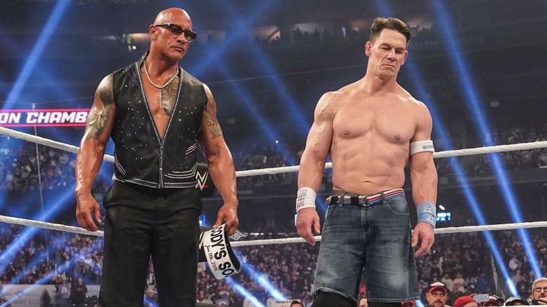 "The Final Boss" Dwayne Johnson and John Cena look down, scowling.