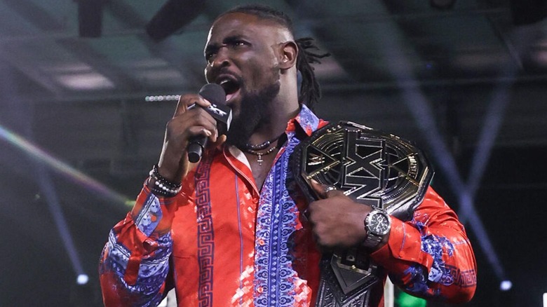 NXT Champion Oba Femi cuts a promo in the middle of the ring on an episode of 