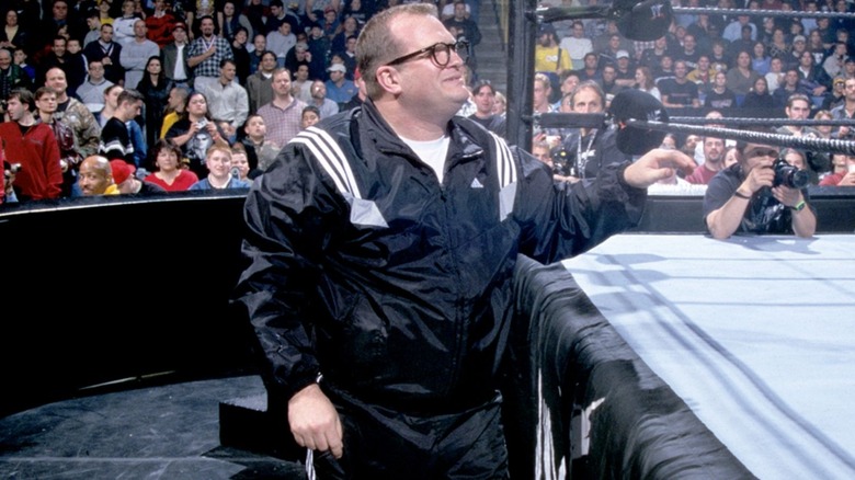 Drew Carey stands by the WWE ring during the Royal Rumble match.