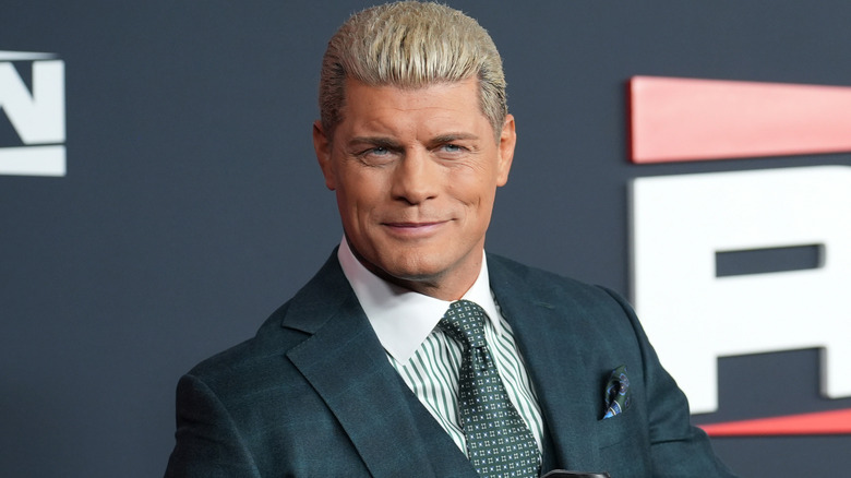 Cody Rhodes wearing a suit