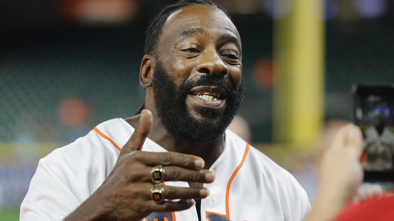 Booker T wearing his WWE Hall of Fame rings