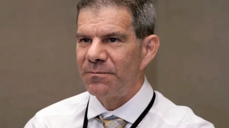 Dave Meltzer looks on waiting for a question from press