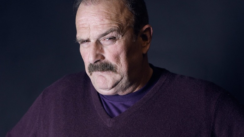 Jake Roberts posing for a portrait