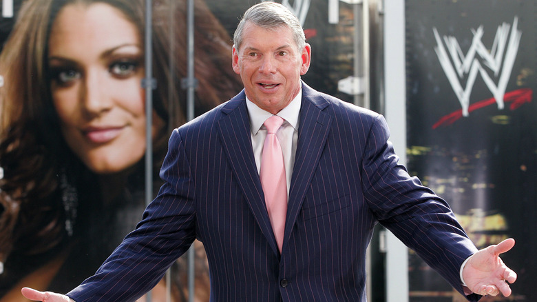 Vince McMahon, presumably imagining people joining the Kiss My Ass club
