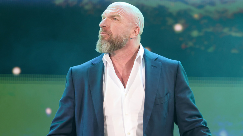 Triple H wearing a suit