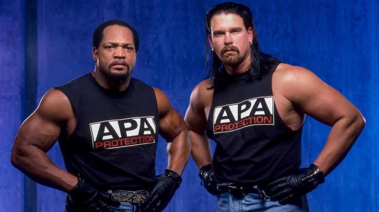 Farooq (Ron Simmons) and Bradshaw (JBL) during a photo shoot as the APA