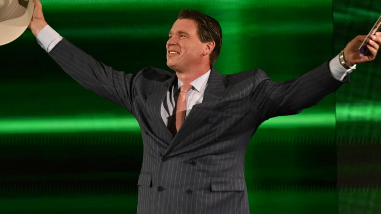 JBL outstretching his arms